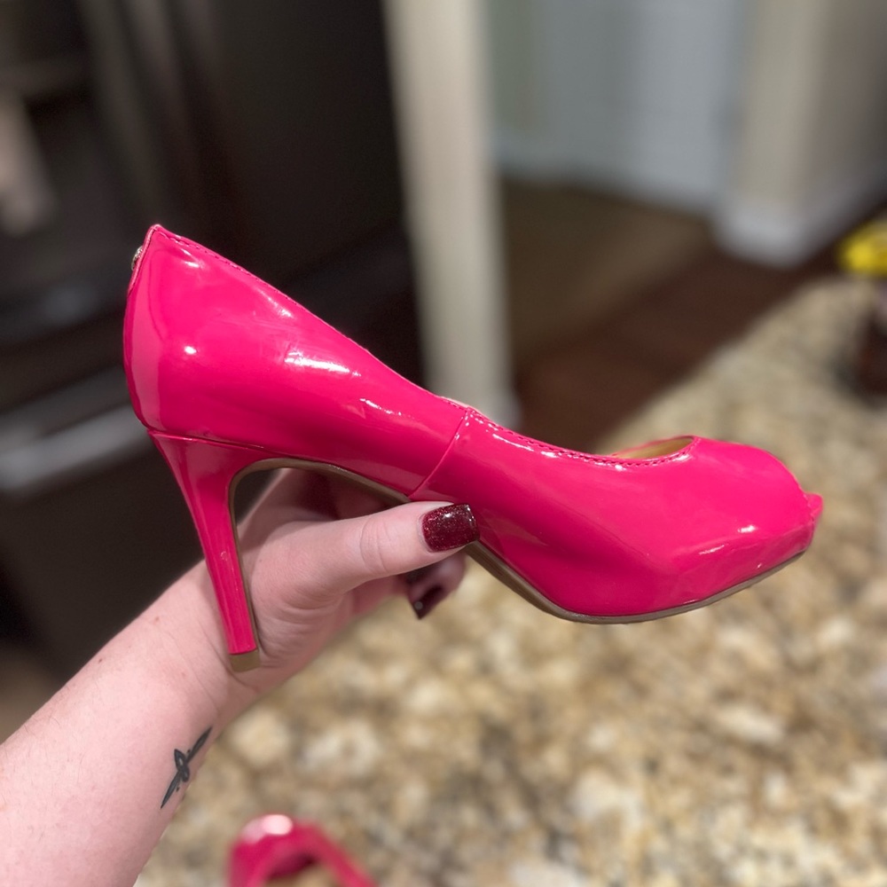 Pink patent pumps